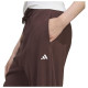Adidas Γυναικείο παντελόνι φόρμας Essentials Small Logo French Terry Cuffed Pants Adidas Γυναικείο παντελόνι φόρμας Essentials Small Logo French Terry Cuffed Pants